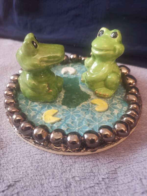Frog and crocodile on the lake, handmade ceramic plate