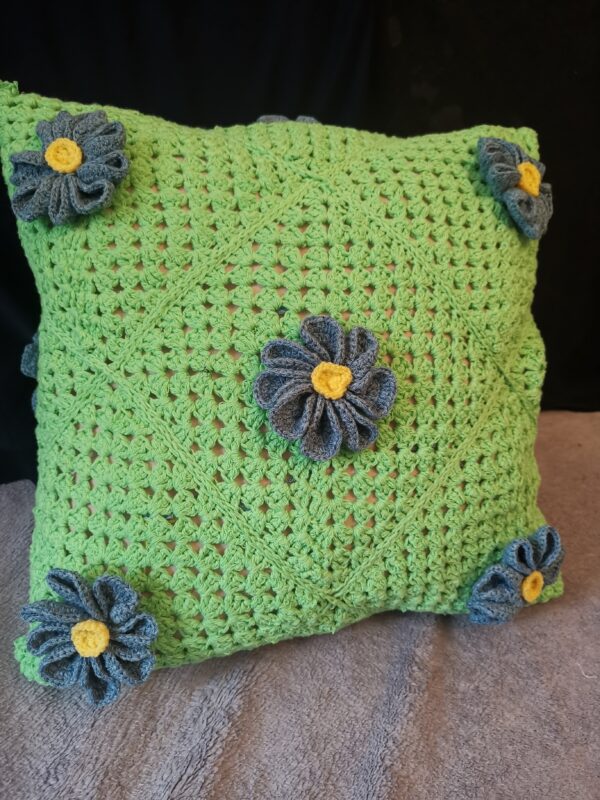 Pillow Daisies on green background knitted cover