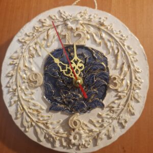 Wallclock flowers blue-white ceramic handmade.
