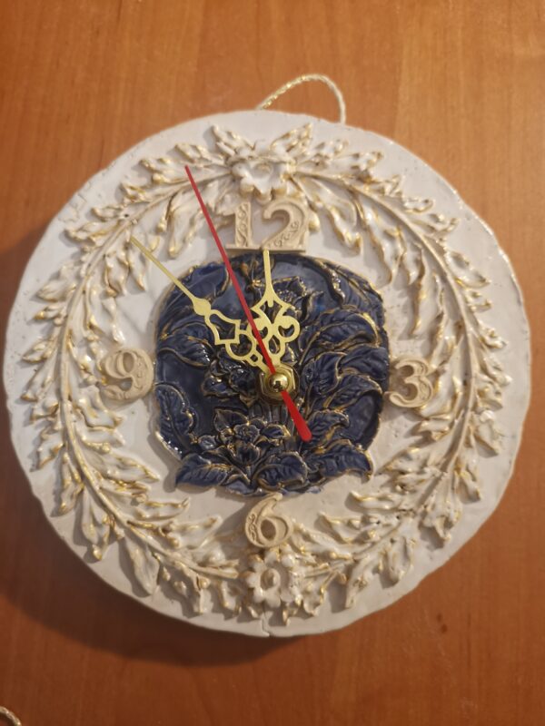 Wallclock flowers blue-white ceramic handmade.